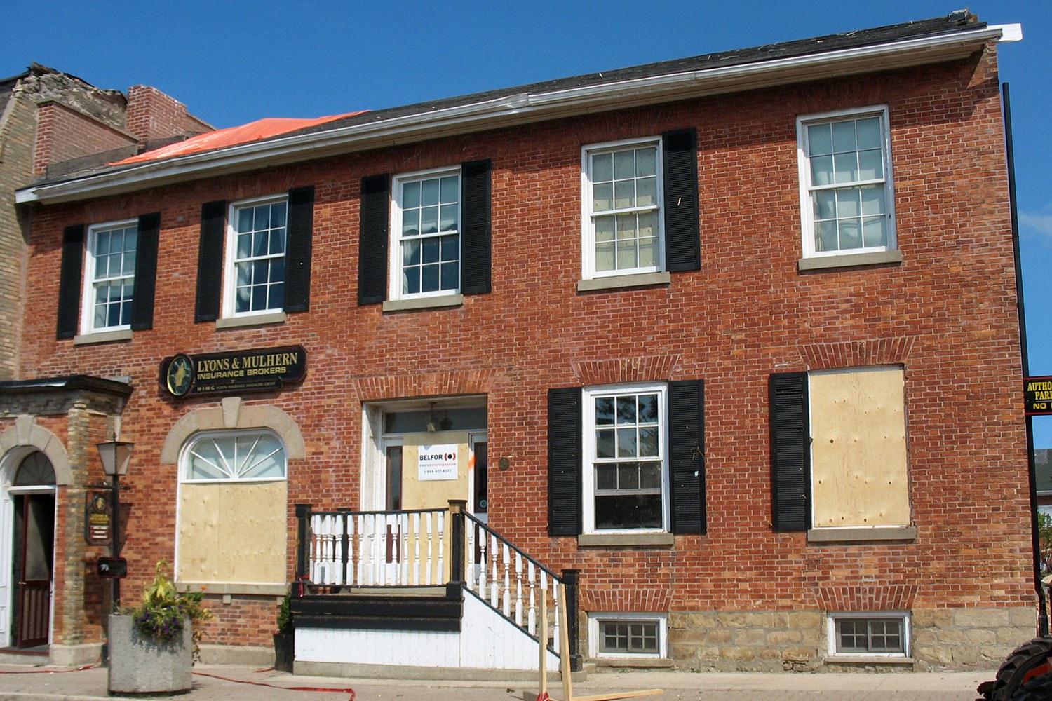 50 West Street, following the tornado and since it was restored (Photos courtesy of Bob Davis)