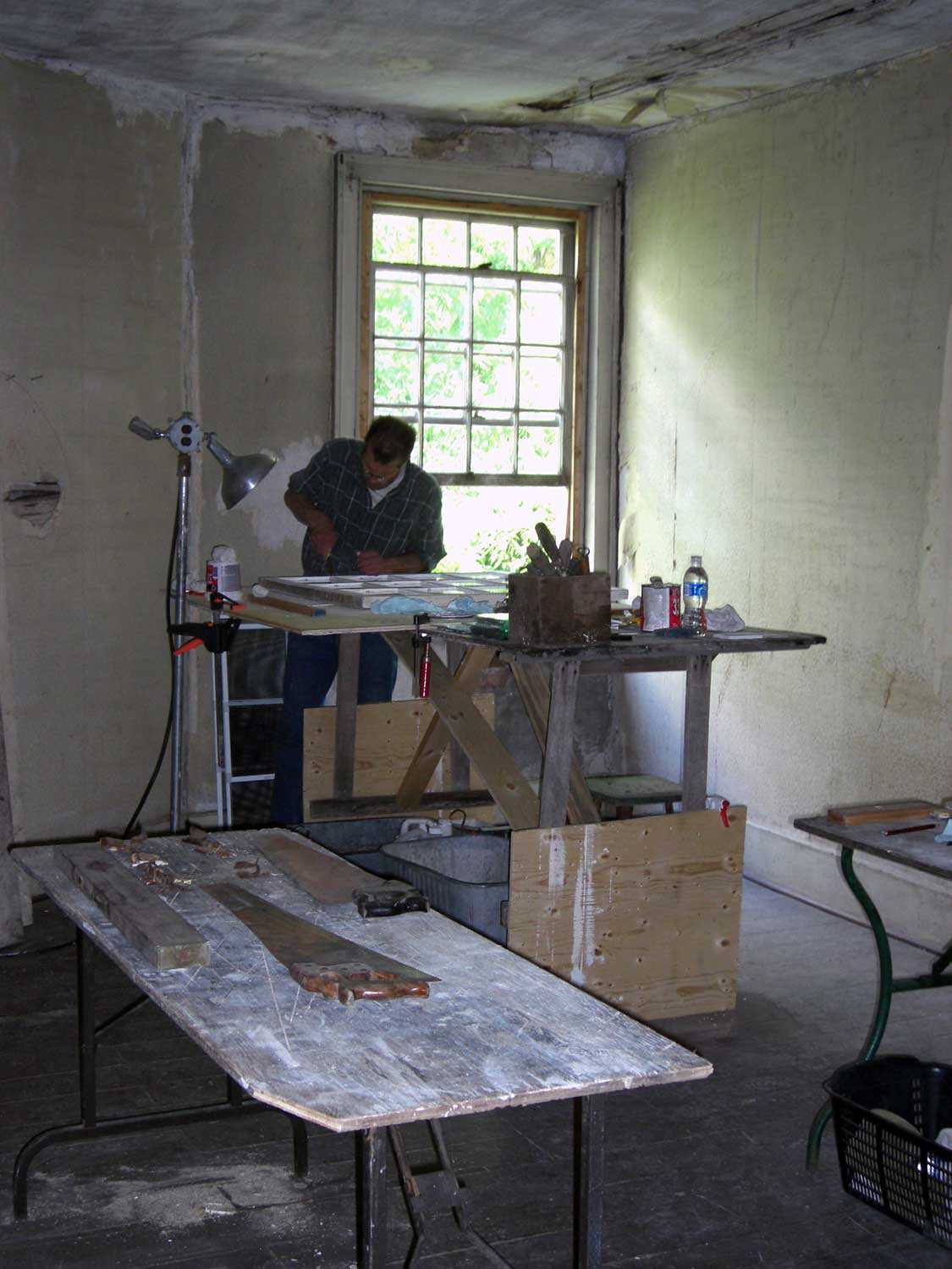 Window repairs using traditional glazing methods at historic Fryfogel Tavern (Perth County). The Trust holds a conservation easement on Fryfogel Tavern.