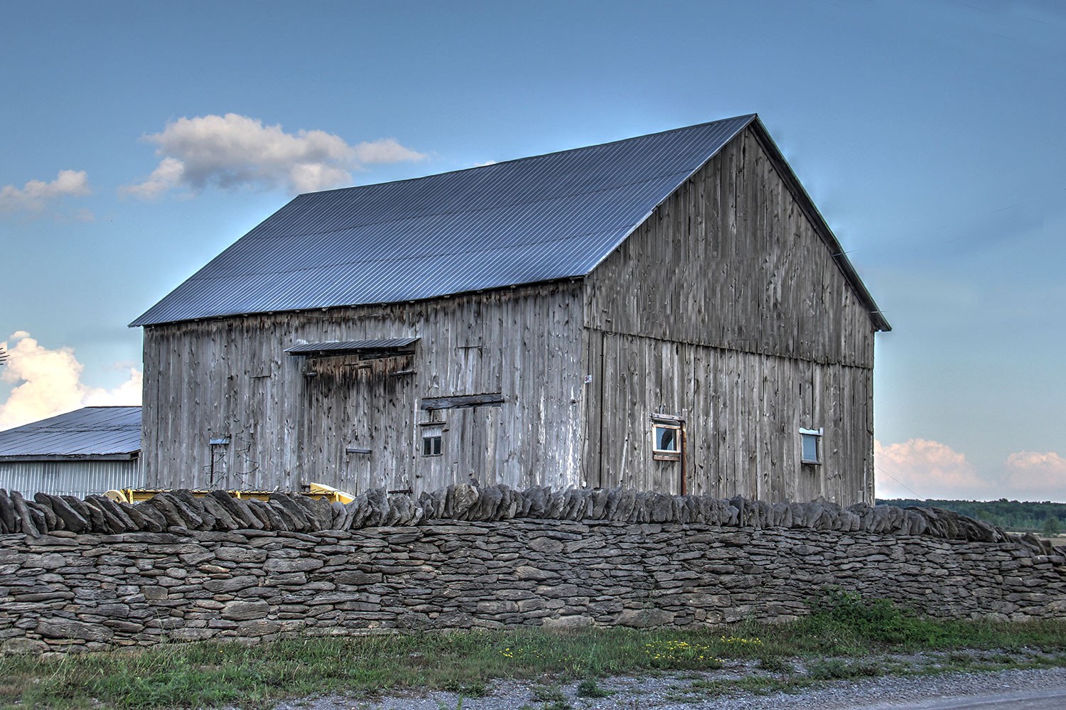 The historical Irish dry stone wall that has been partially restored, located on Amherst Island. (Photo: Andrea Cross)