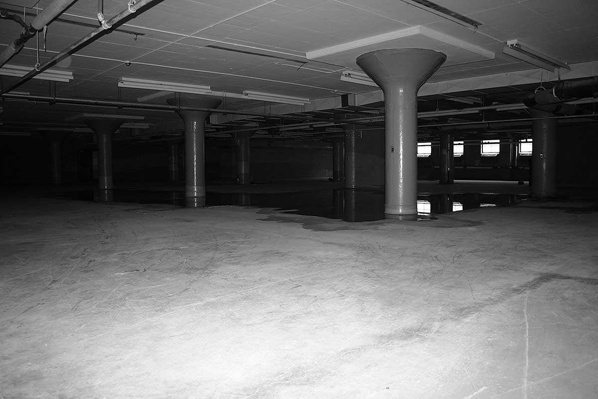 Because the post office was outfitted with heavy sorting machinery, the building’s concrete floors had to be heavily reinforced. This feature ultimately enabled the basement to be converted into a parking garage, an appealing feature for this project.