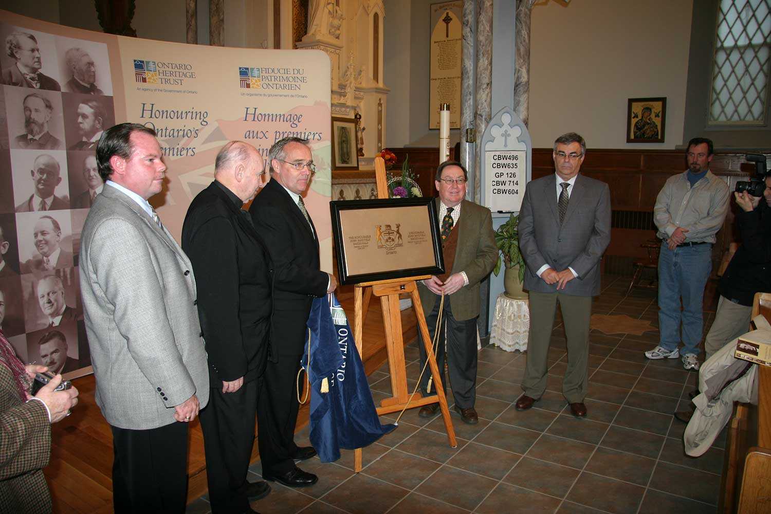 Unveiling a plaque to commemorate the gravesite of Ontario's first premier